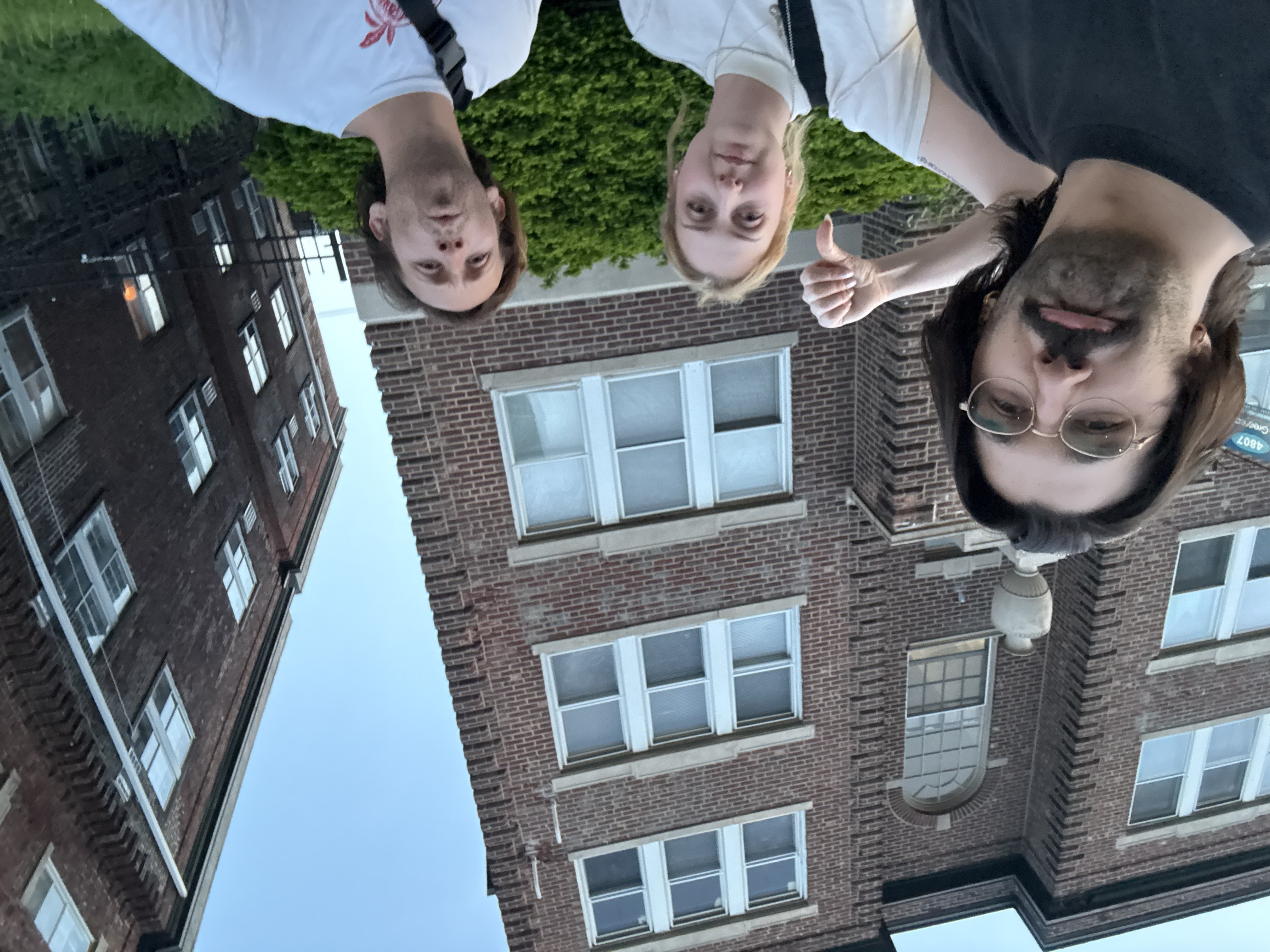 Joe and David and Caroline outside Raetwon's house